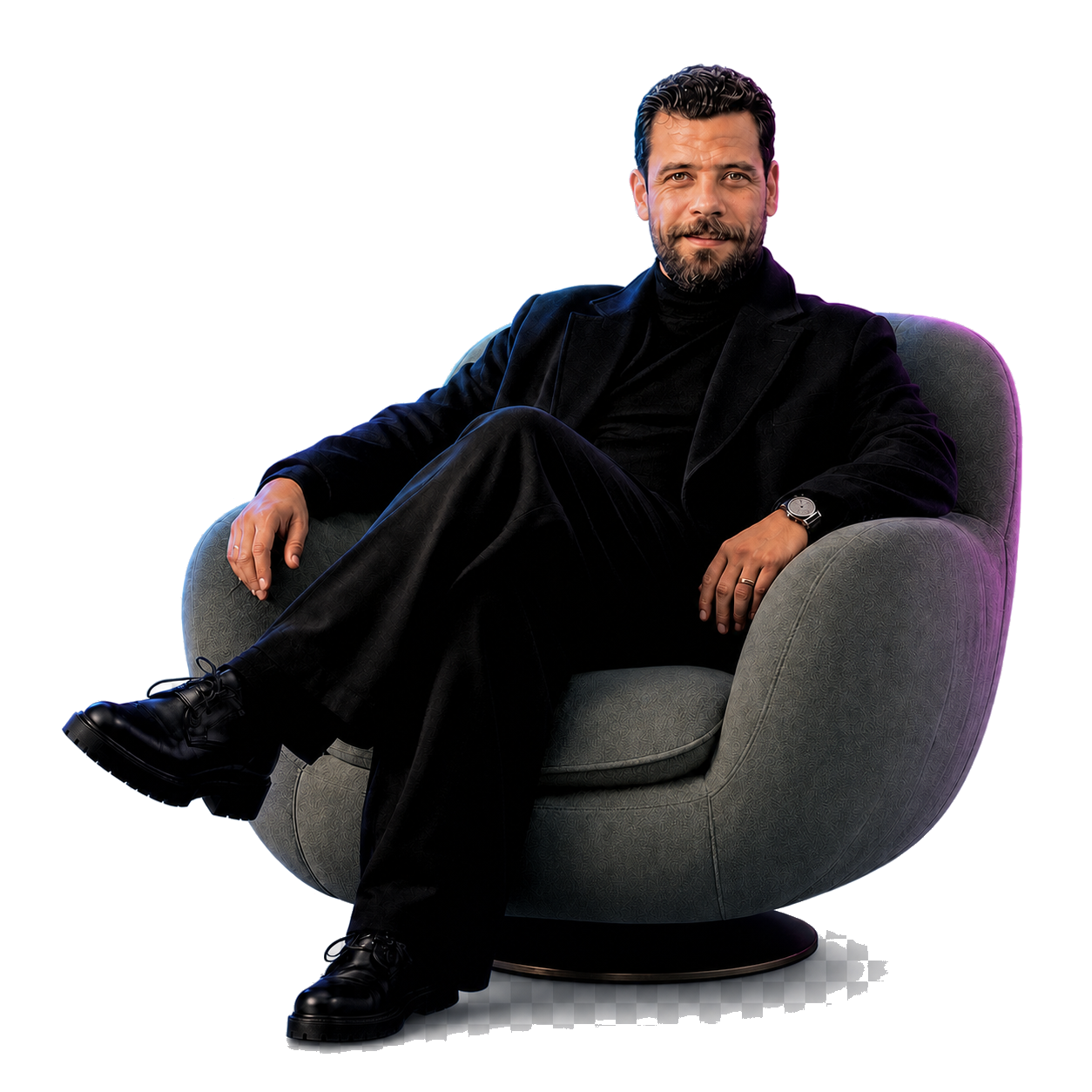 أ. وجدي أبو العز جالسًا على الكرسي
